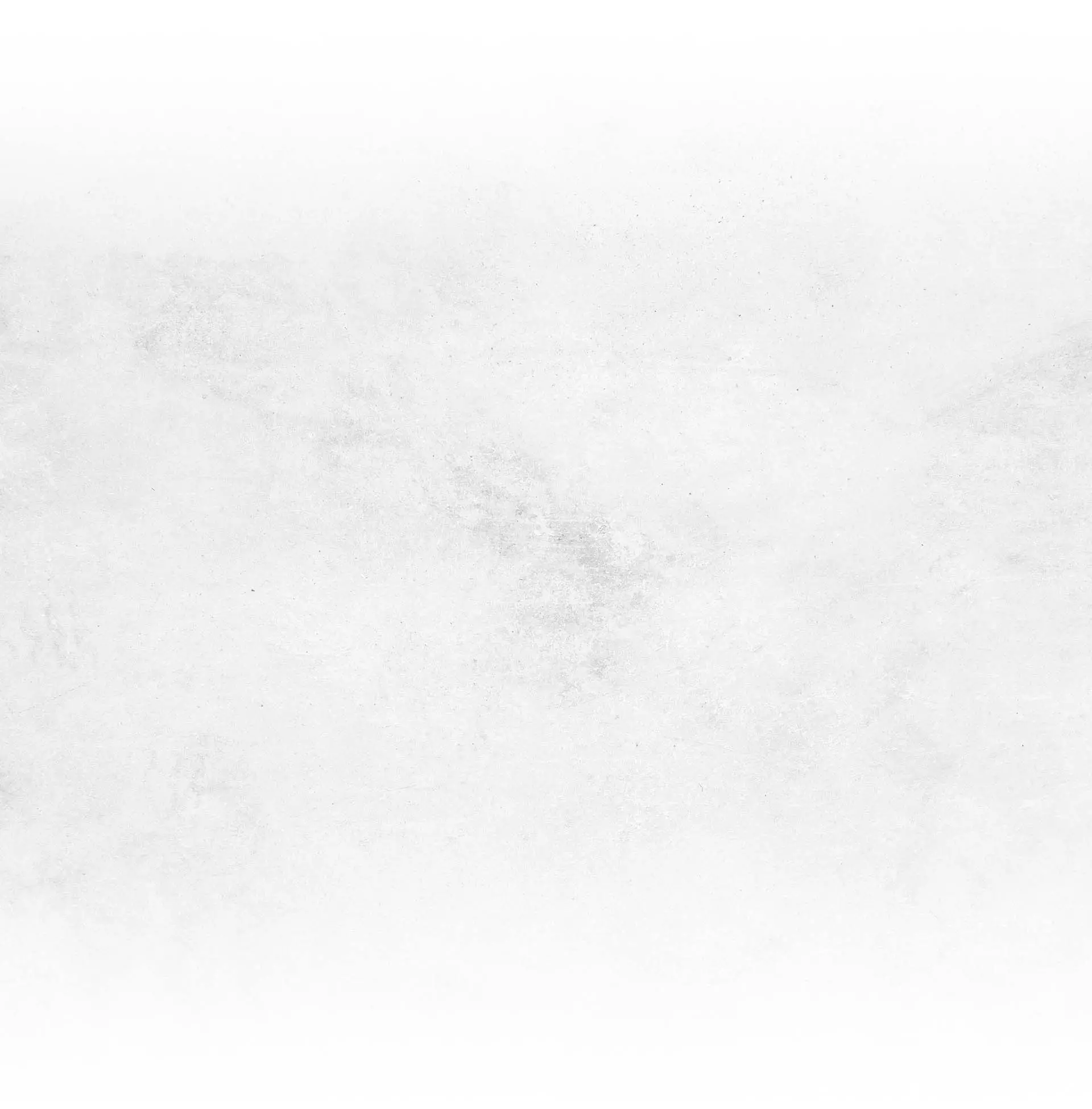 Faint gray textured background with subtle streaks and smudges on a light surface.