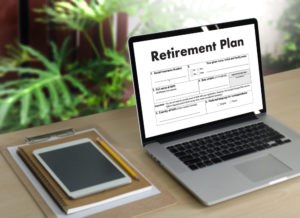 A laptop screen displaying a digital retirement plan document.