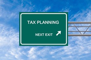 Tax Tips Next Exit Traffic Sign on Blue Sky.